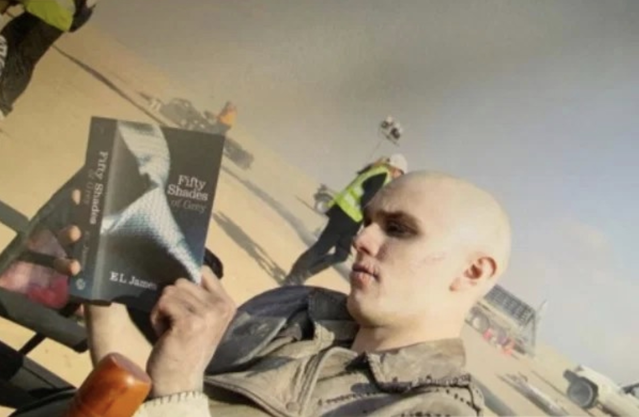 Nicholas Hoult catches up on his reading while on location. Mad Max: Fury Road, 2015